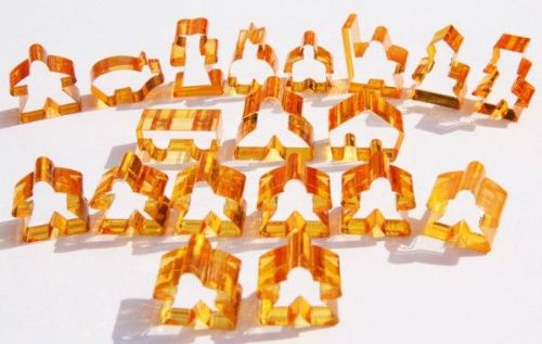 Complete 19 piece orange transparent set of Carcassonne meeples